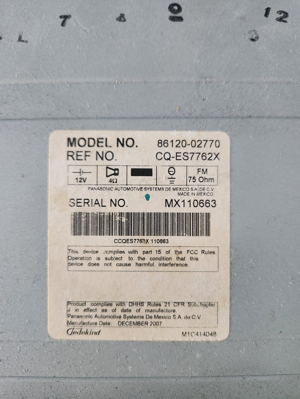 Panasonic Car Stereo Unit in Light Gray and White Label